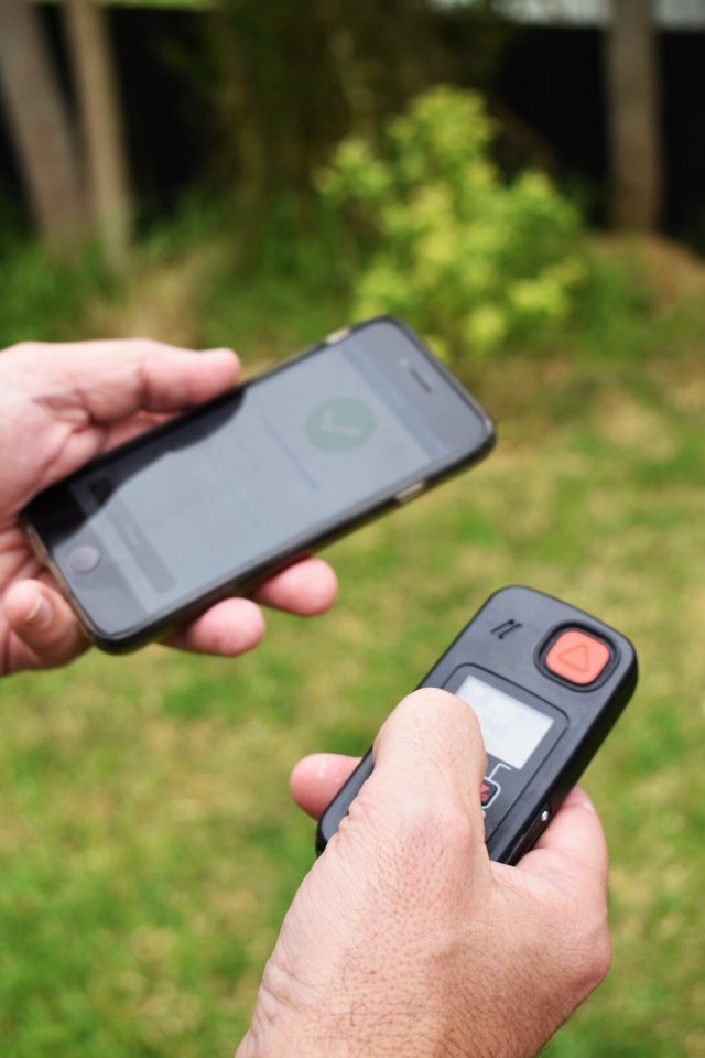 Twig One lone worker device shown in use with the GetHomeSafe app