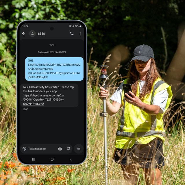 A surveyor in a high-visibility vest checking her phone in long grass, beside a screen showing a GetHomeSafe activity started by SMS