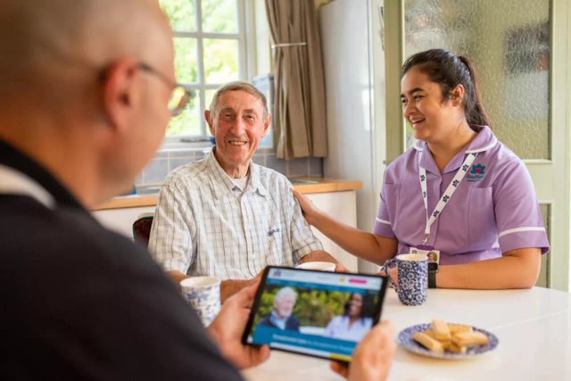 Radfield Home Care professional supporting an older client in their own home