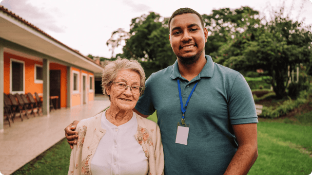 Not-for-profit community worker engaging with people in a local outreach setting